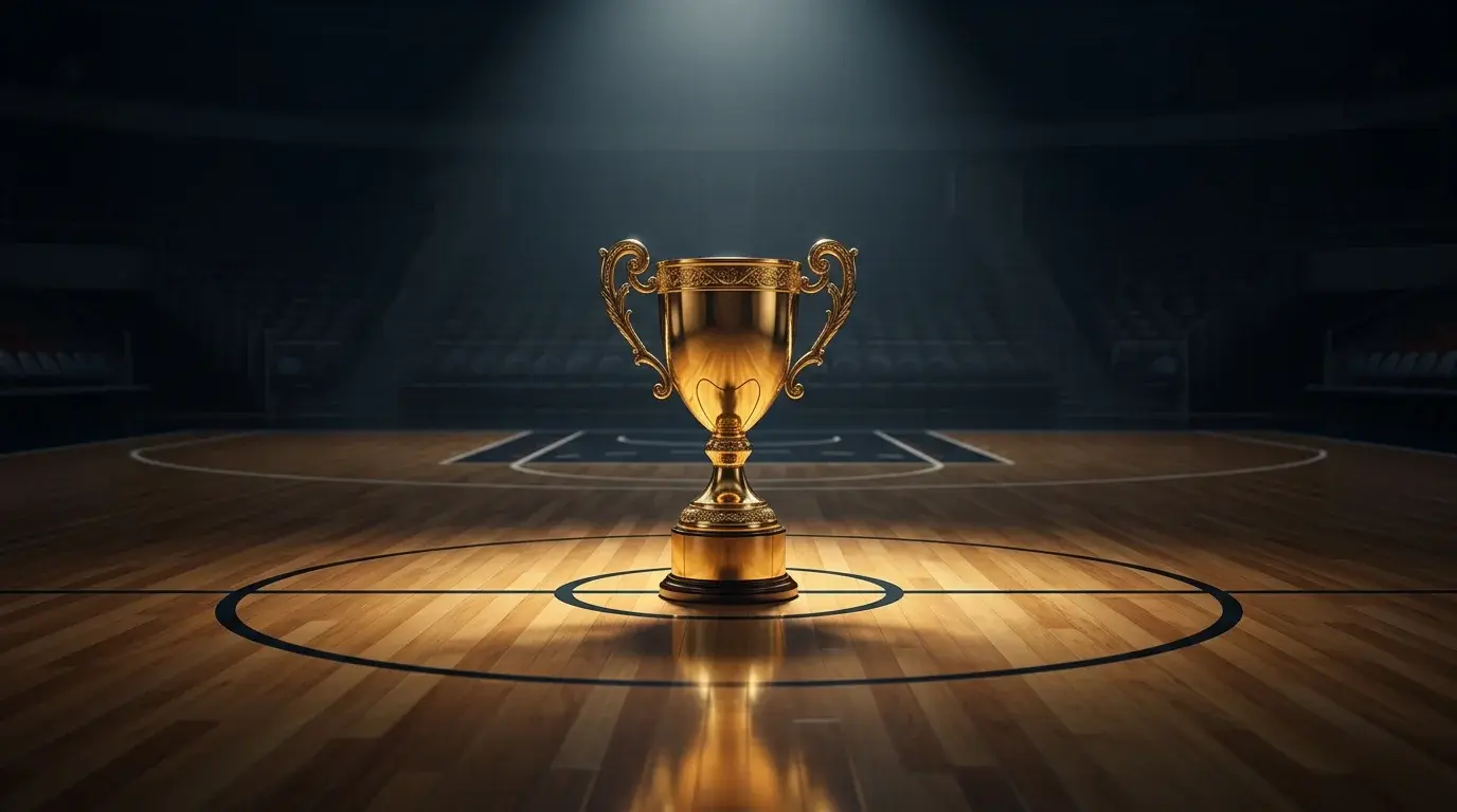NBA championship trophy gleaming under spotlight on a basketball court with empty arena seats behind