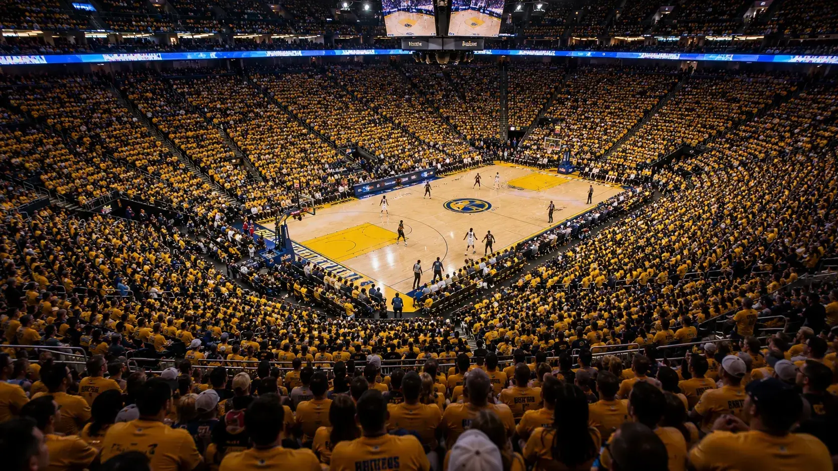 Packed NBA arena during a home game with the court visible from above and fans filling every seat